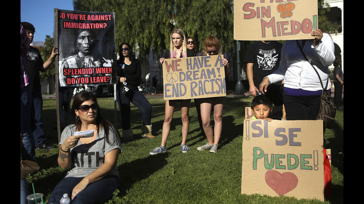 Protesters rally against the Santa Barbara News-Press's use of "the I-word."